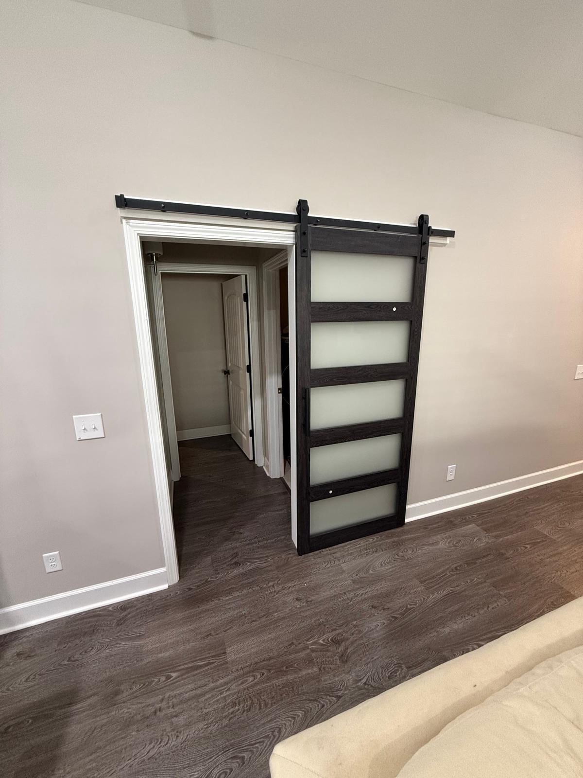 Barn-style sliding door with frosted glass